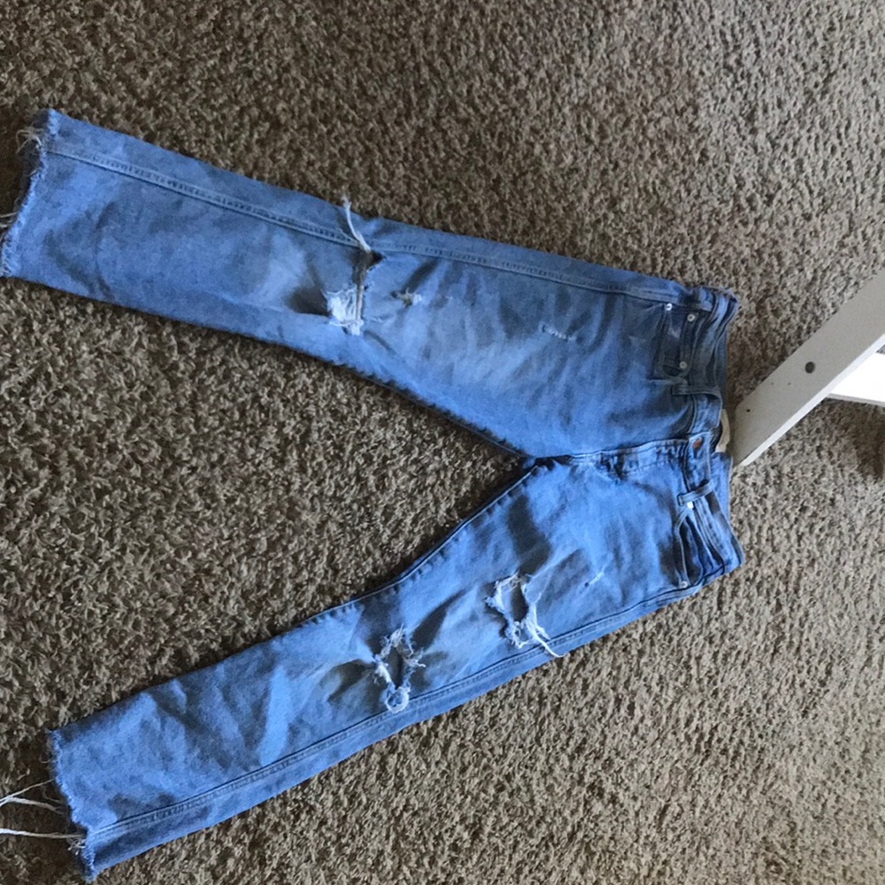 Blue jeans with holes in them